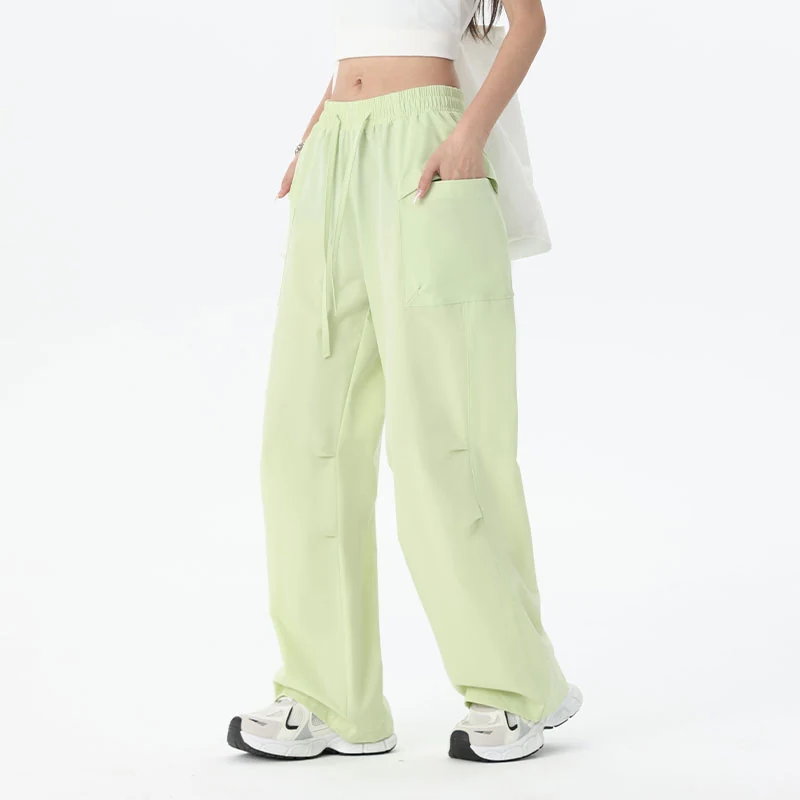 Light green relaxed parachute pants, style 615